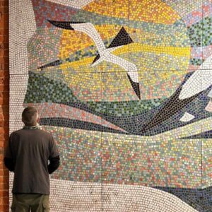 Soaring Bird Over Sunburst Abstract Mosaic Wall Art Panel